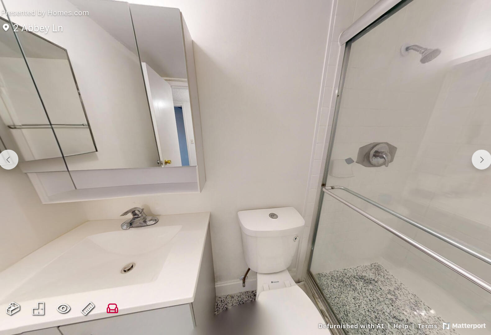 2 2 Abbey Lane, Unit 203 Delray Beach, FL 33446 - Photo 19 of 22 a bathroom with a sink a toilet and shower