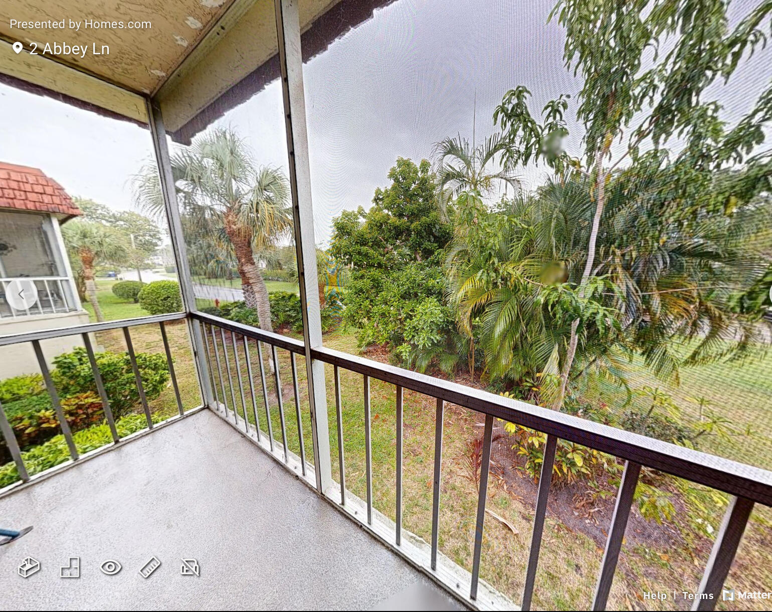 2 2 Abbey Lane, Unit 203 Delray Beach, FL 33446 - Photo 2 of 22 a view of a street view from a balcony