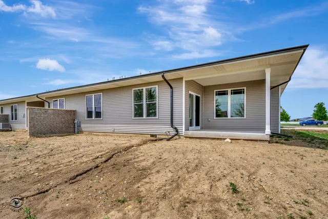 a house with yard in front of it