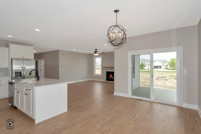 a view of a kitchen and a window