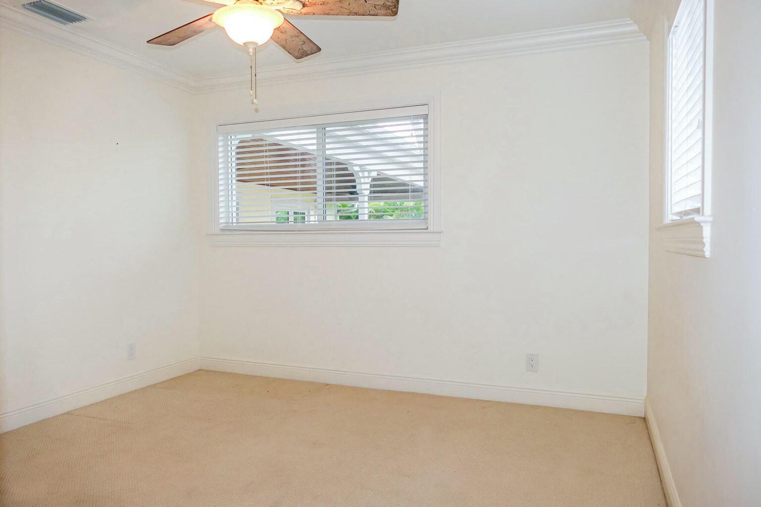 18014 Perigon Way Jupiter, FL 33458 - Photo 19 of 35 an empty room with a window