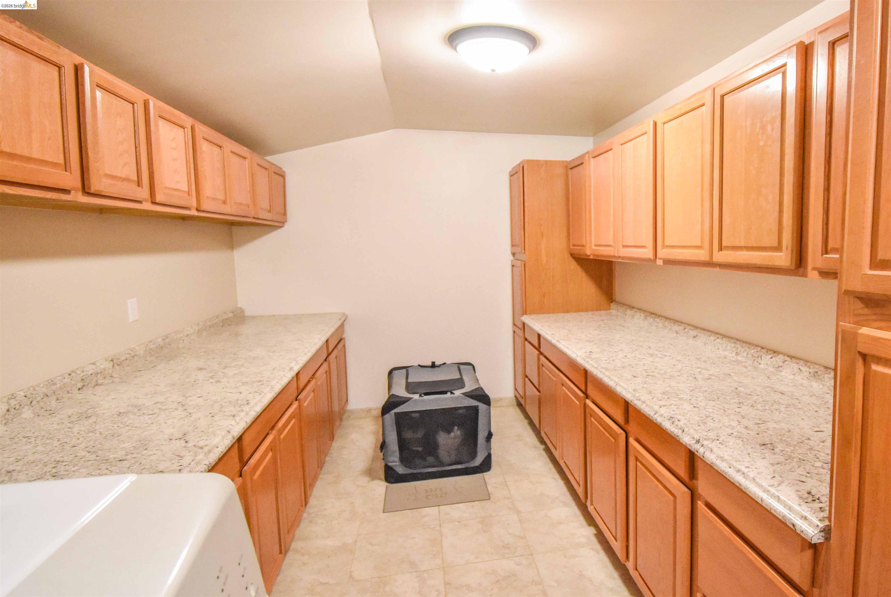 21932 Phoenix Lake Road Sonora, CA 95370 - Photo 20 of 44 Storage galore! Propane water heater also in this room.