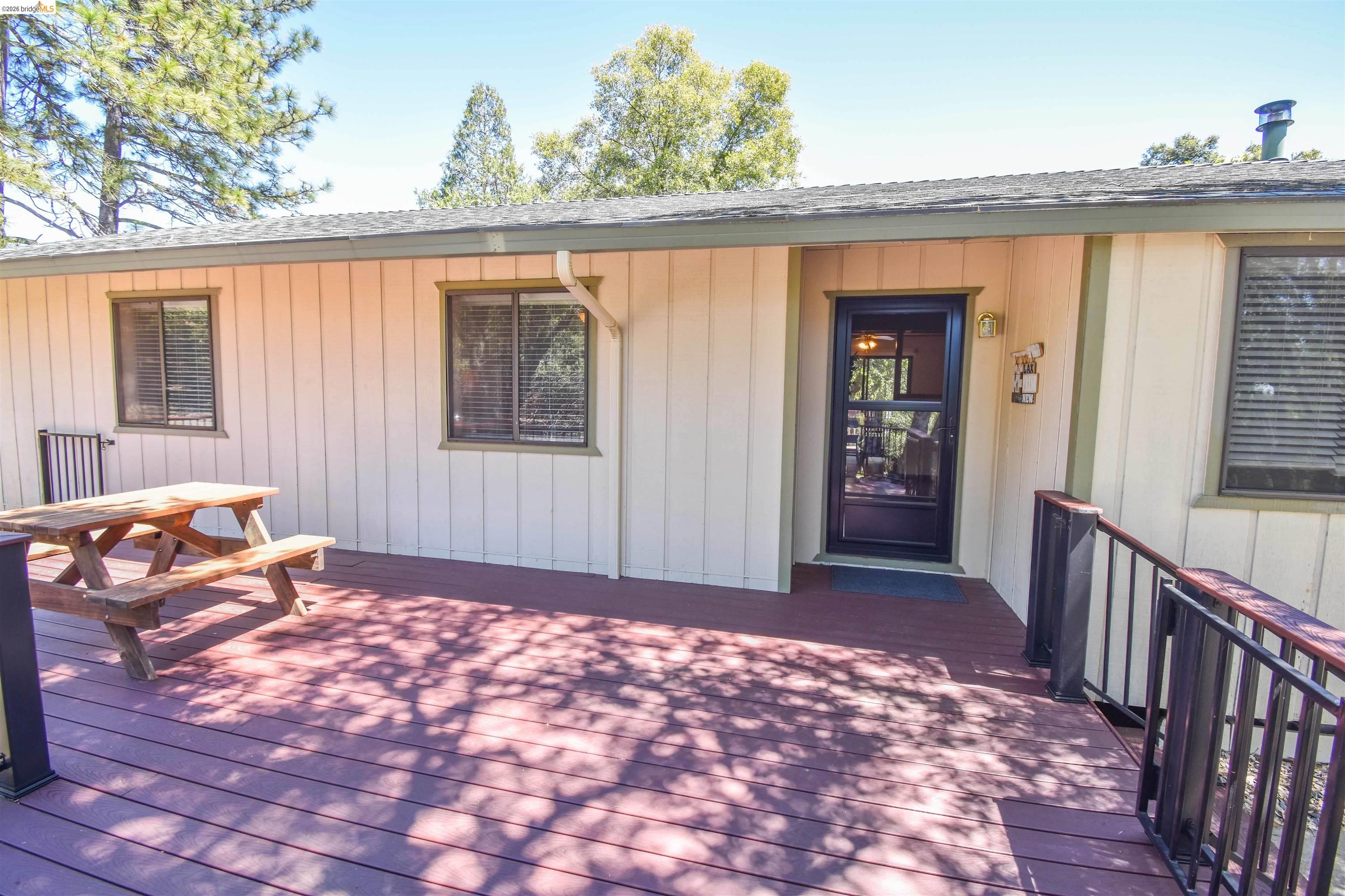 21932 Phoenix Lake Road Sonora, CA 95370 - Photo 9 of 44 Deck treads manmade materials.