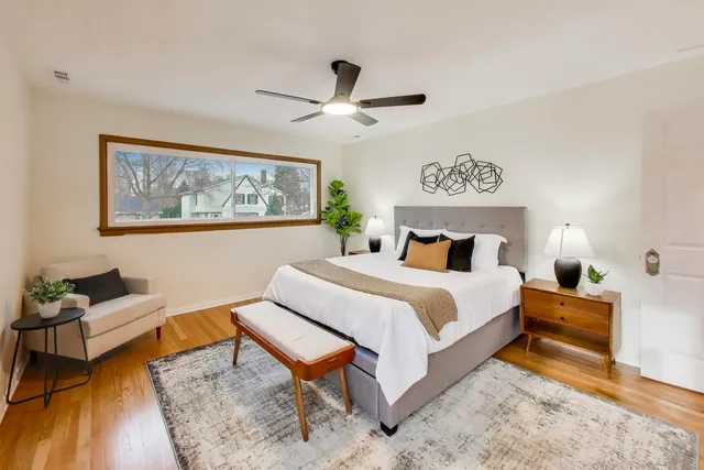 a bed room with a bed and a couch