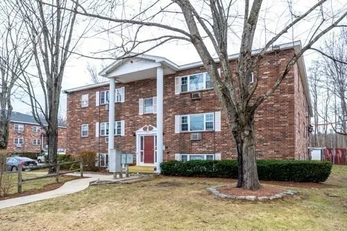 a sign board with a street sign