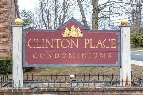 39 Berlin Street, Unit 315 Clinton, MA 01510 - Photo 22 of 22 a sign board with a street sign