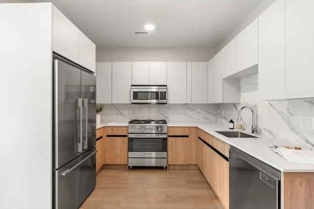 $684,000 | 249 Corey Road, Unit 408, Boston, MA 02135