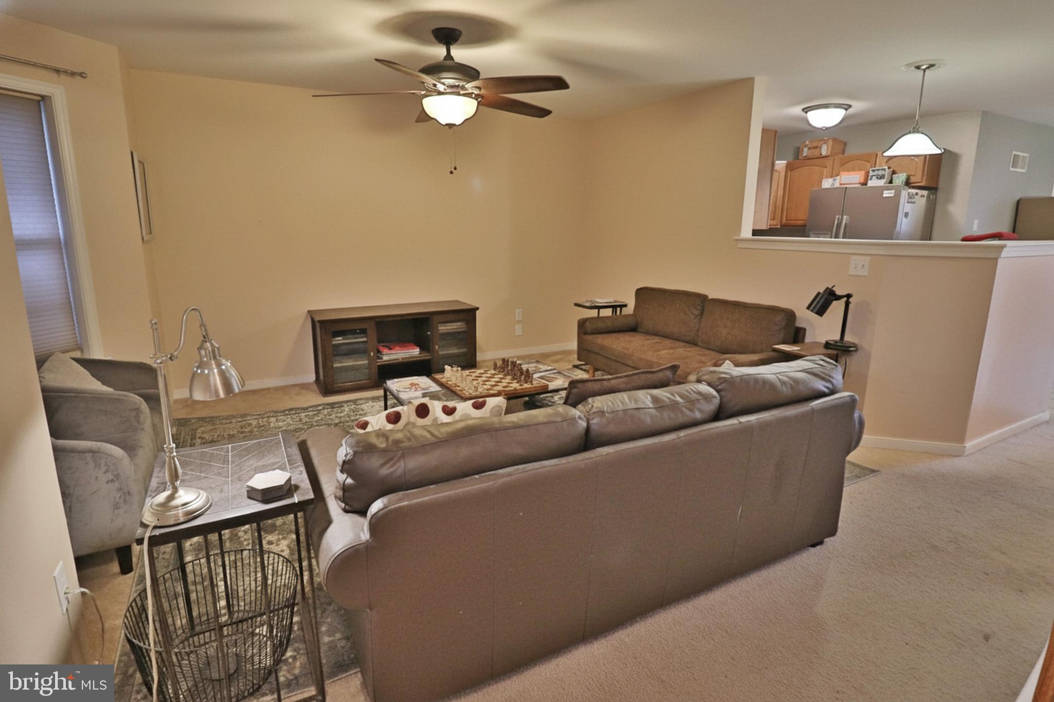 486 Balmer Road Lititz, PA 17543 - Photo 15 of 31 a living room with furniture and a chandelier