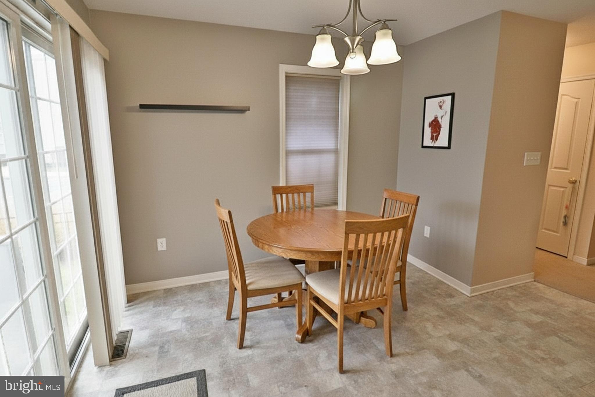 486 Balmer Road Lititz, PA 17543 - Photo 18 of 31 a view of a dining room with furniture and chandelier