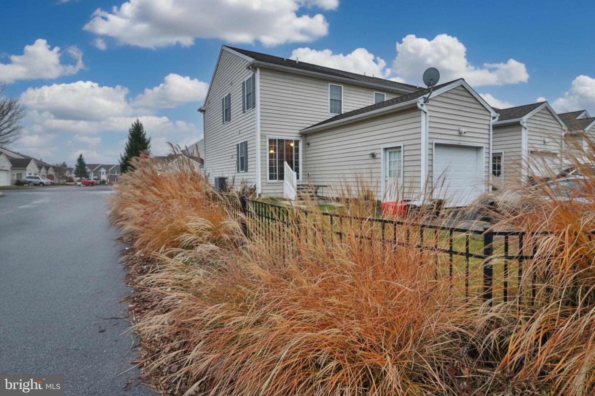 486 Balmer Road Lititz, PA 17543 - Photo 23 of 31 a front view of a house with a yard and garage