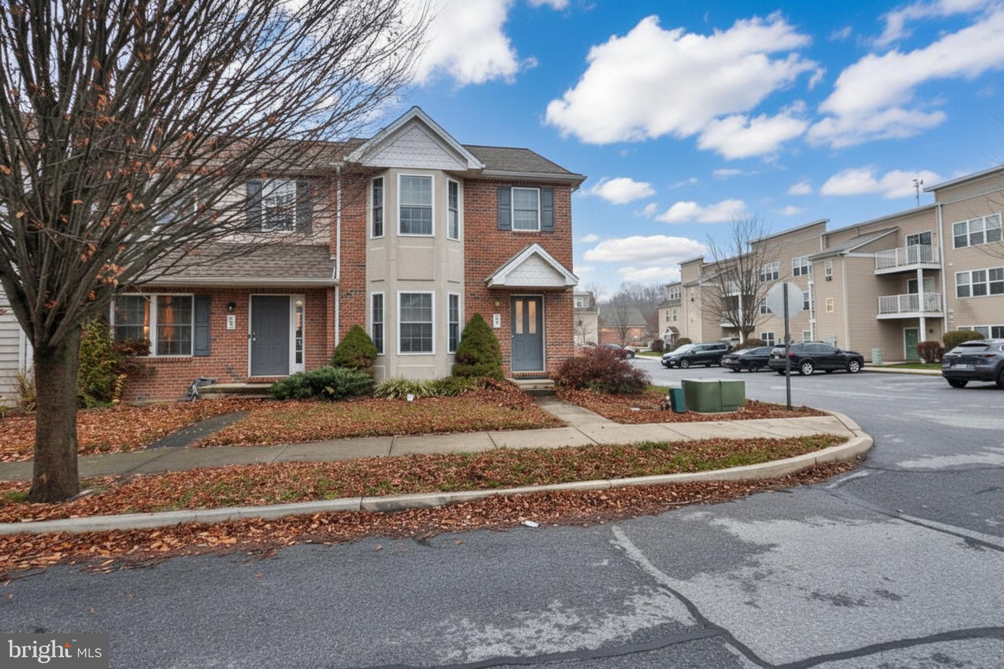 486 Balmer Road Lititz, PA 17543 - Photo 24 of 31 a front view of a house with a yard and garage