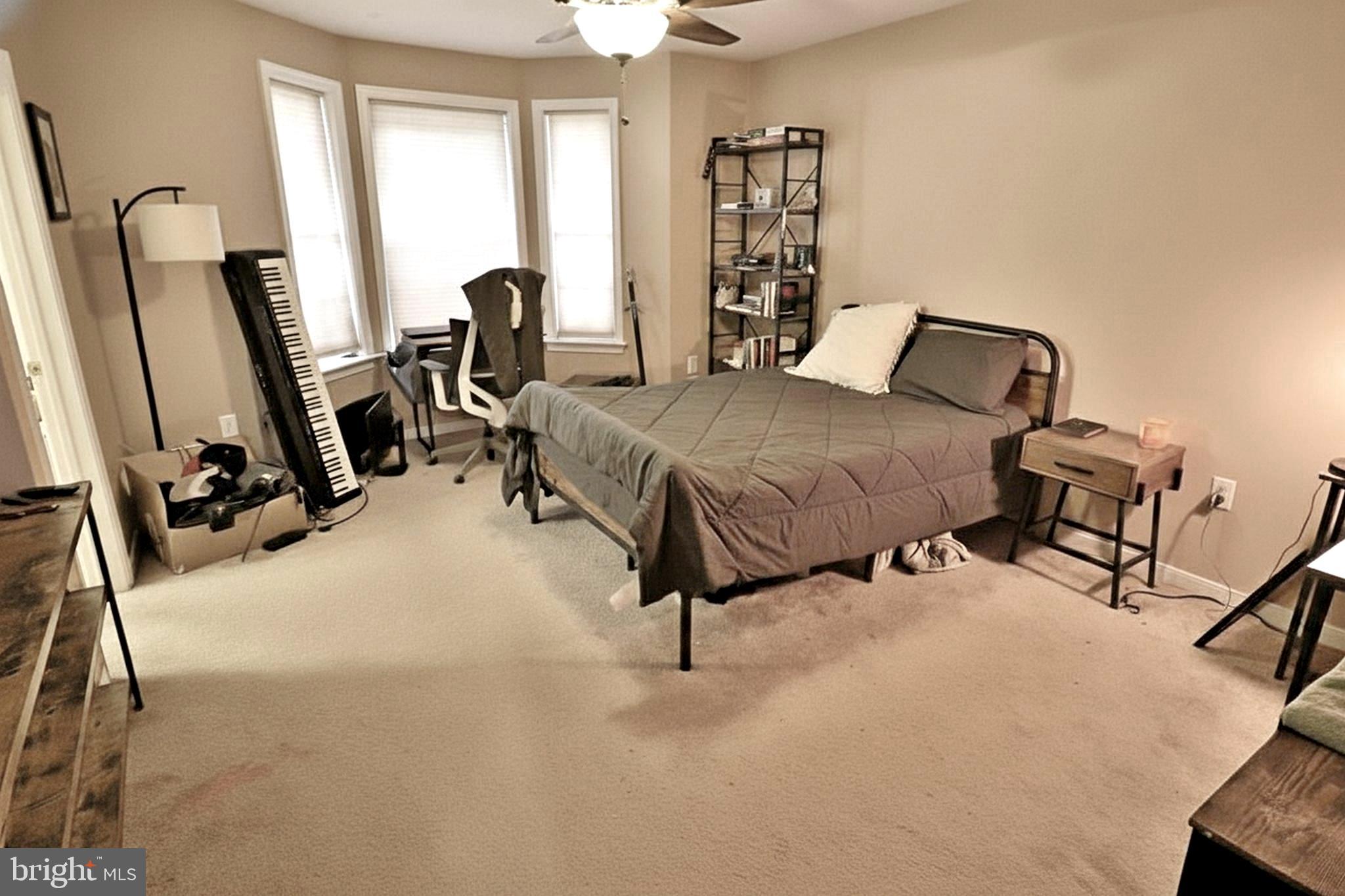 486 Balmer Road Lititz, PA 17543 - Photo 8 of 31 a bedroom with furniture and a window