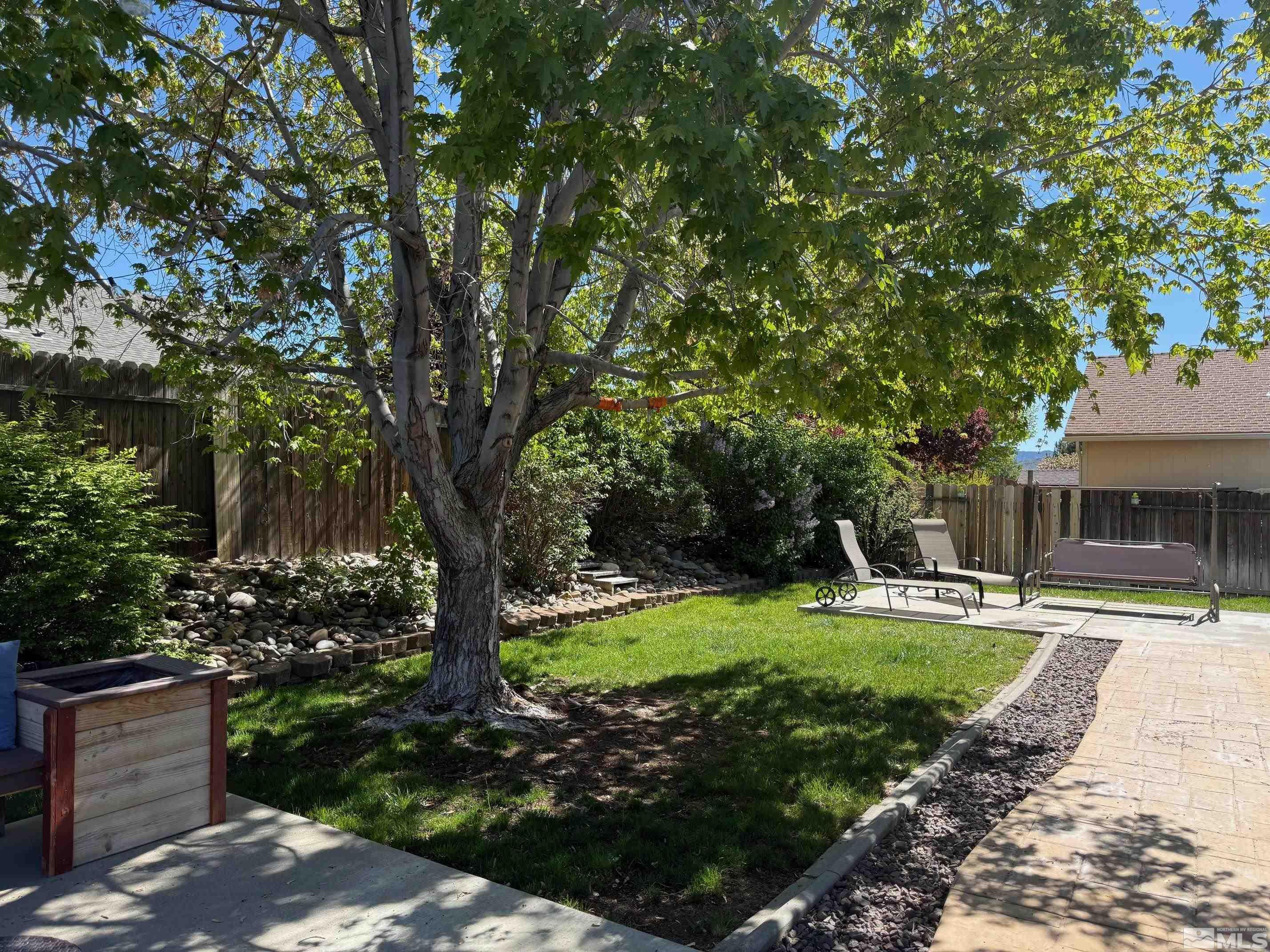 980 Sunview Drive Carson City, NV 89705 - Photo 19 of 27 a view of a backyard with garden