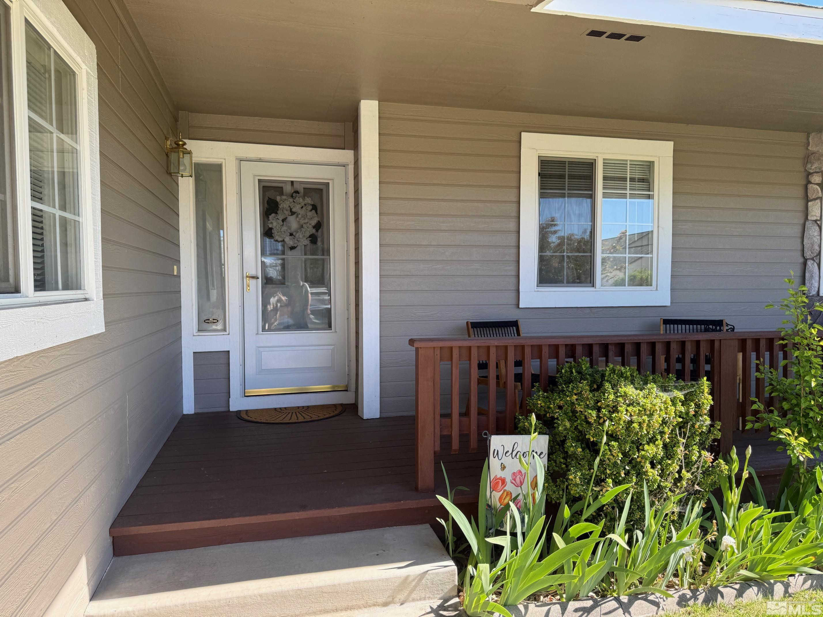 980 Sunview Drive Carson City, NV 89705 - Photo 26 of 27 a front view of a house with a yard