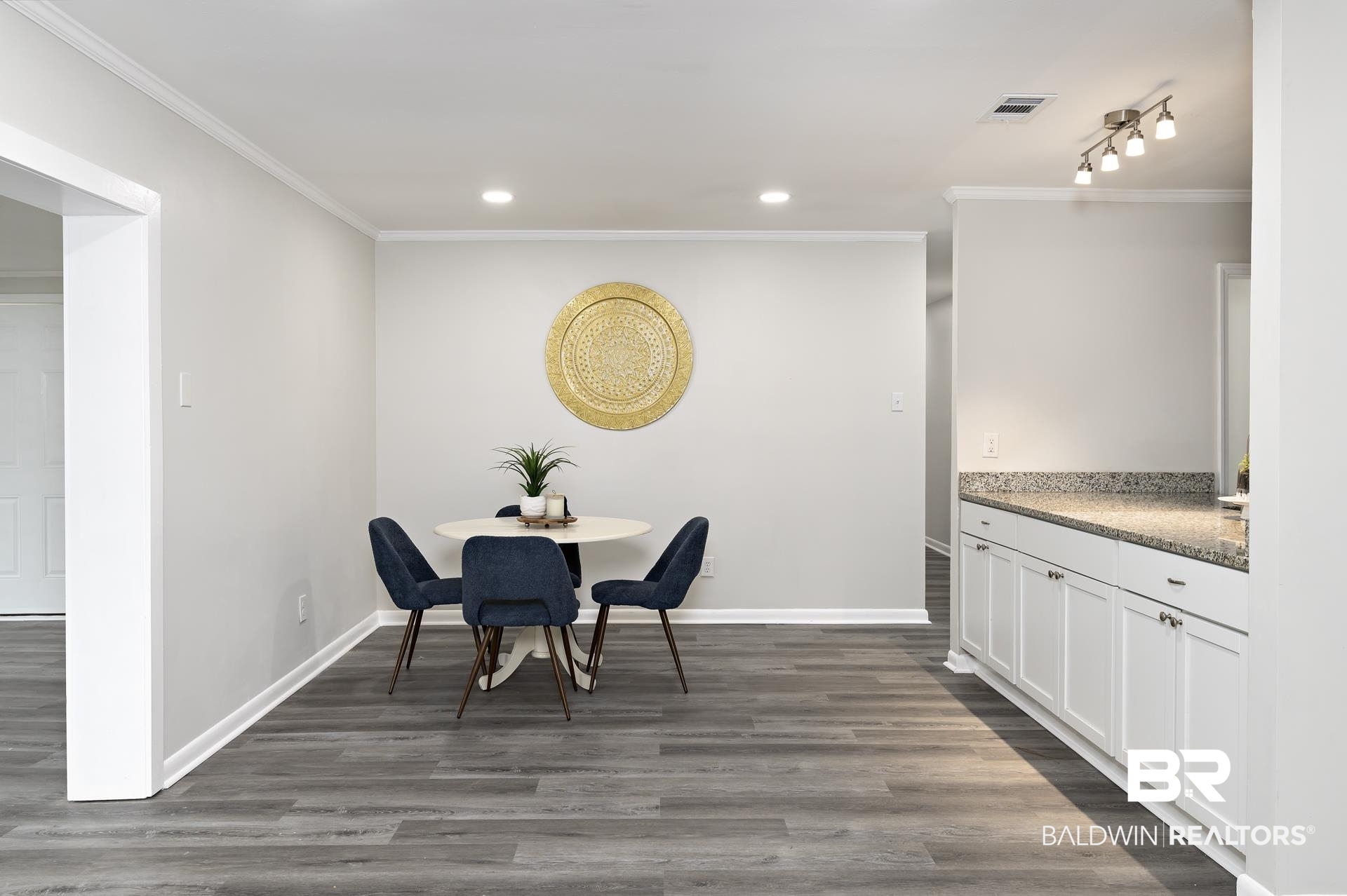 5922 Sunnyside Drive Mobile, AL 36619 - Photo 5 of 51 Dining space with crown molding, recessed lighting, dark wood finished floors, and baseboards