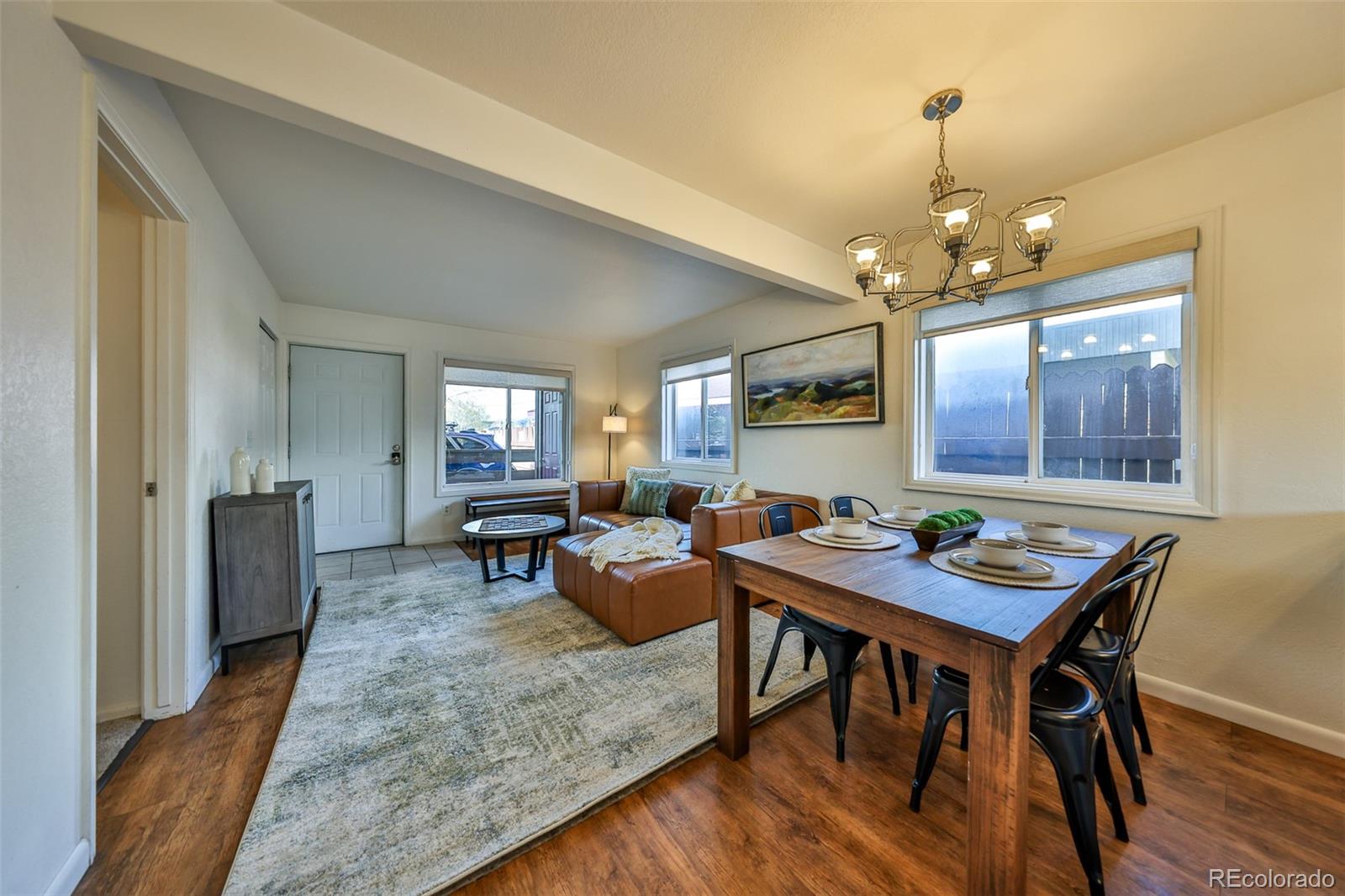 233 Fraser Avenue, Unit R1 Fraser, CO 80442 - Photo 8 of 23 a view of a dining room with furniture window and wooden floor