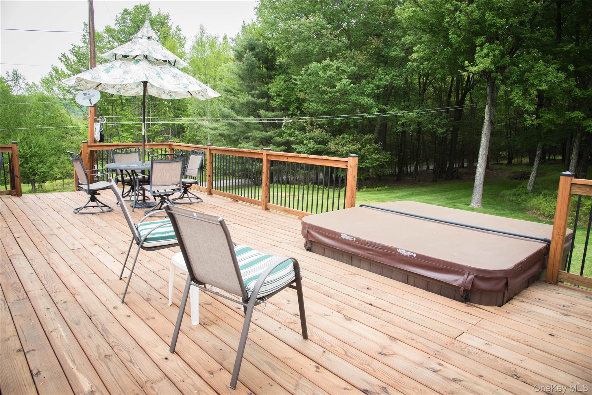 502 Myers Road Neversink, NY 12765 - Photo 38 of 38 a view of a chairs and tables on the wooden deck