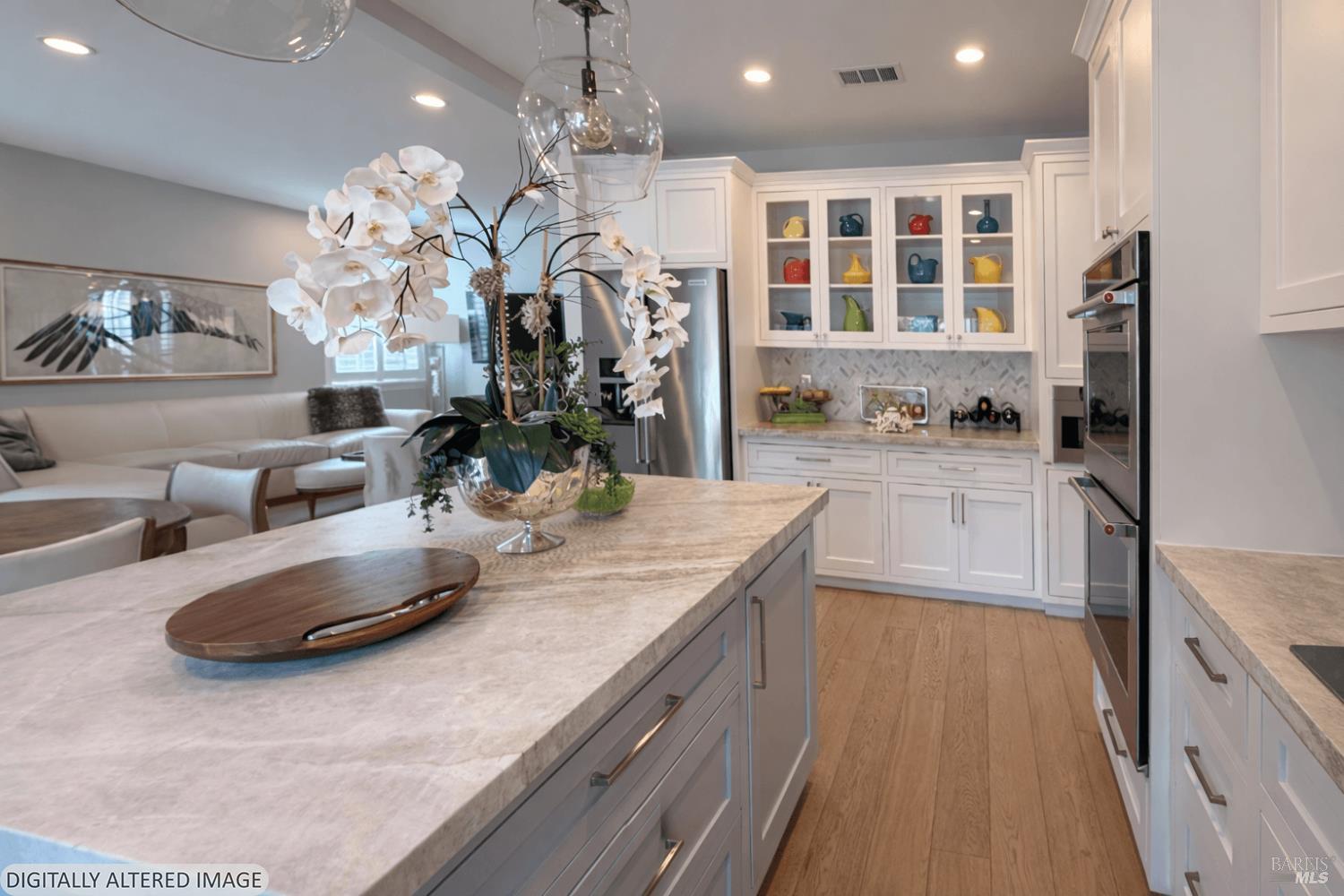 3726 Cannes Place Santa Rosa, CA 95403 - Photo 21 of 69 Here is another view of the kitchen with the family room to the back left of this photo. Notice the upper cabinet doors with glass.