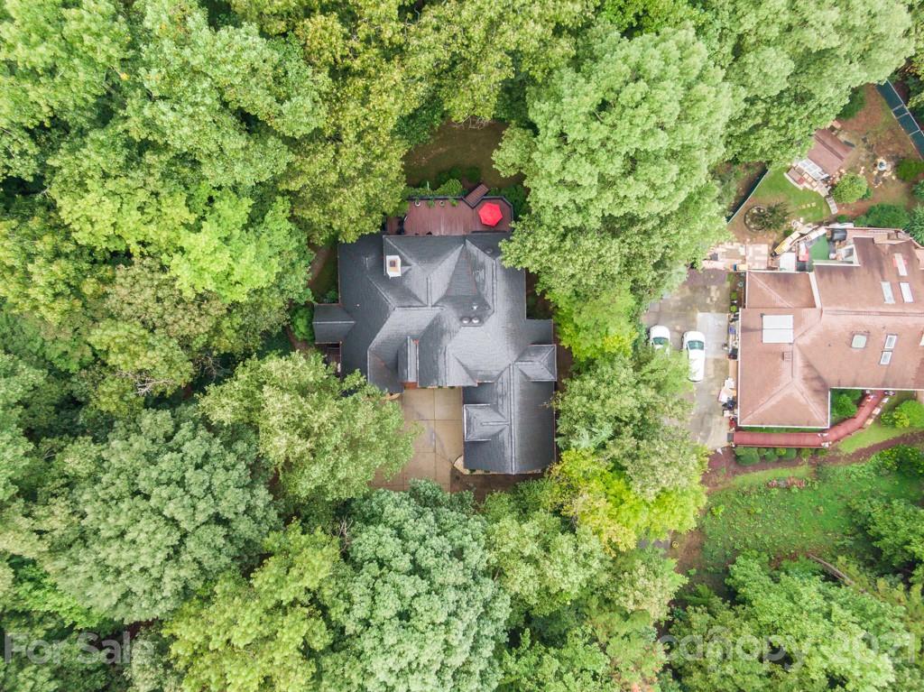 833 Amanda Drive Matthews, NC 28104 - Photo 2 of 48 an aerial view of a house with a yard and garden