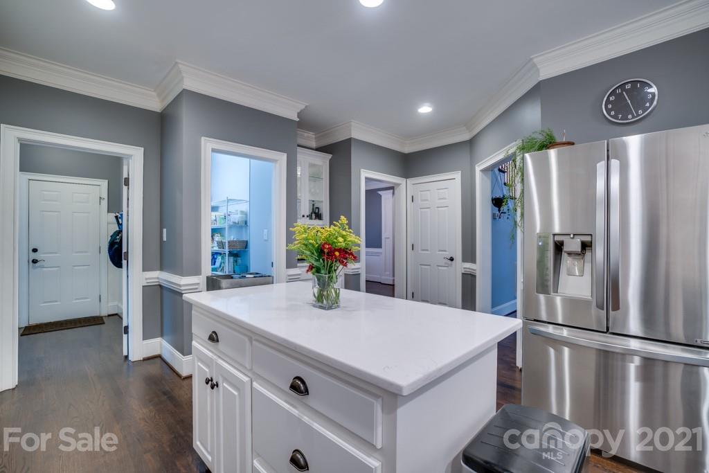 833 Amanda Drive Matthews, NC 28104 - Photo 23 of 48 a kitchen with stainless steel appliances a refrigerator a sink a stove and a refrigerator