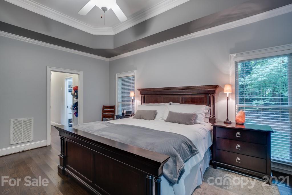 833 Amanda Drive Matthews, NC 28104 - Photo 29 of 48 a bedroom with a bed and a dresser