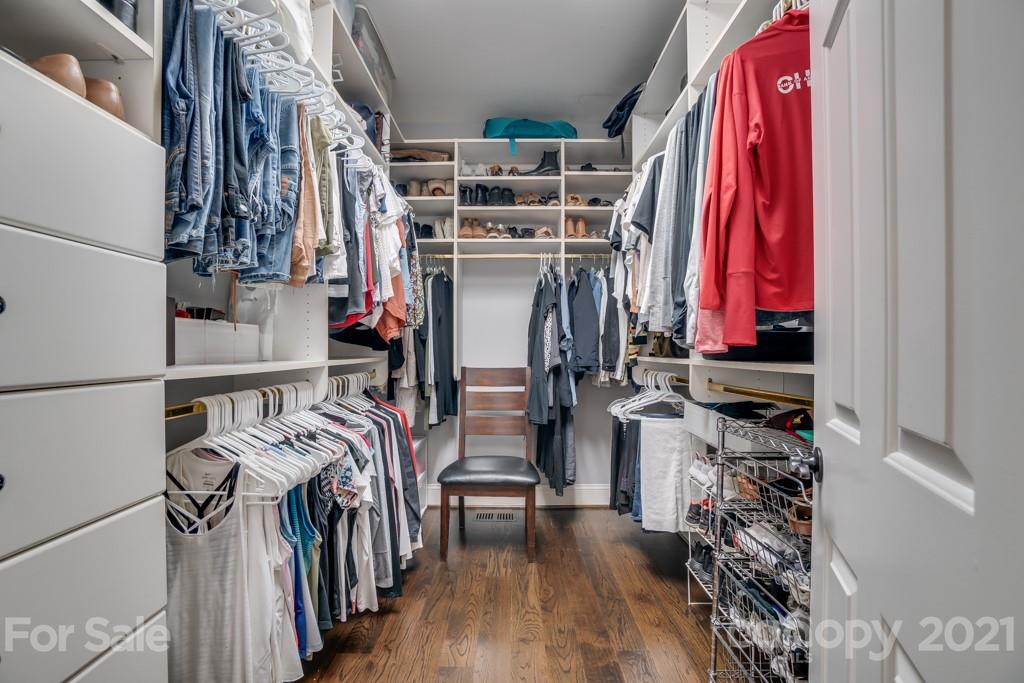 833 Amanda Drive Matthews, NC 28104 - Photo 32 of 48 a view of walk in closet with clothes and shoes