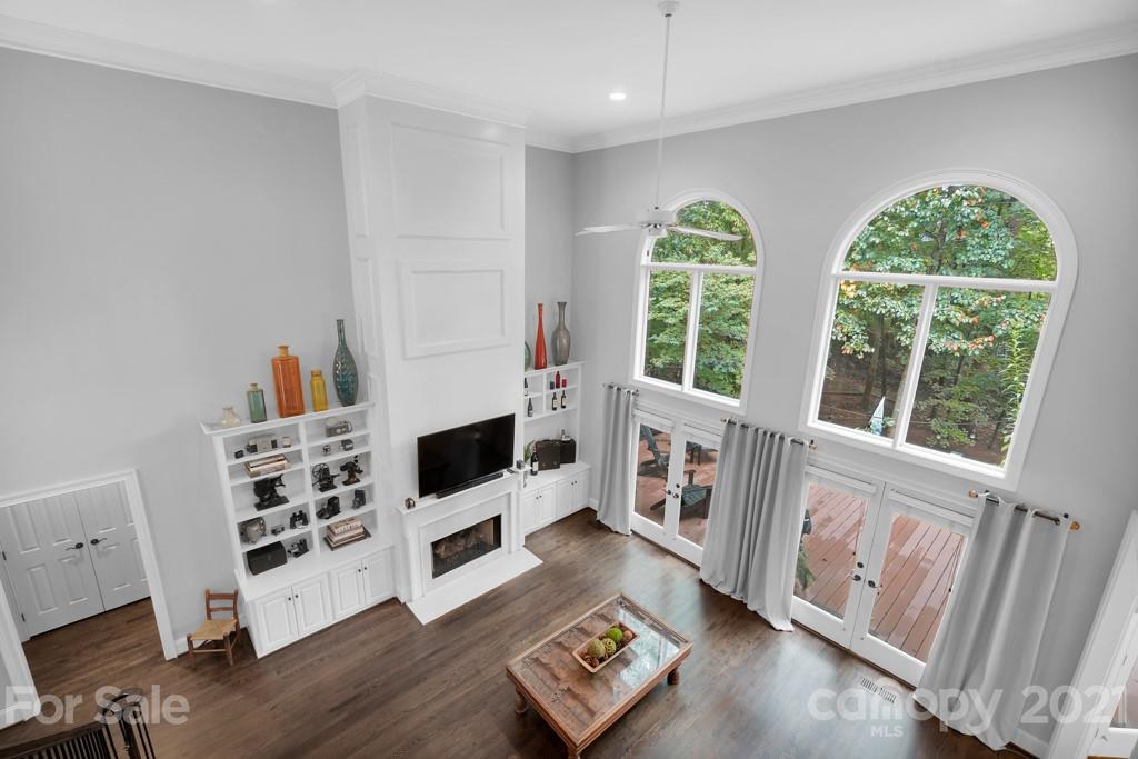 833 Amanda Drive Matthews, NC 28104 - Photo 35 of 48 a living room with furniture and a flat screen tv