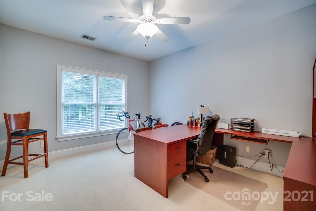 833 Amanda Drive Matthews, NC 28104 - Photo 36 of 48 a view of a workspace with furniture and a window