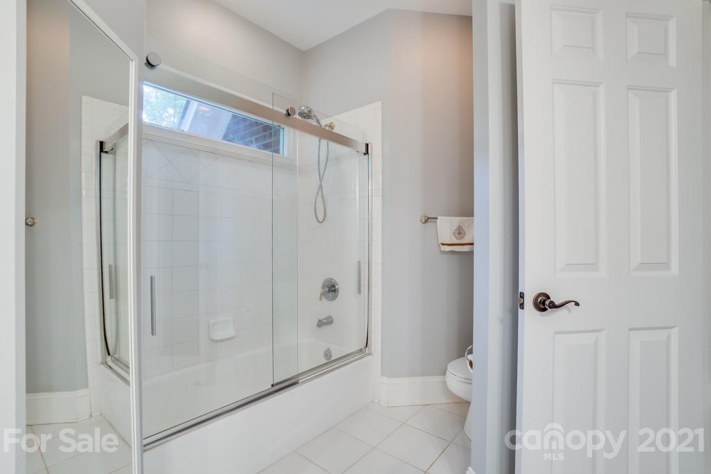 833 Amanda Drive Matthews, NC 28104 - Photo 40 of 48 a bathroom with a shower and a toilet