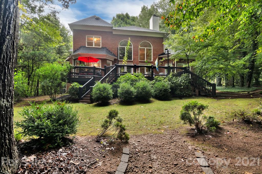 833 Amanda Drive Matthews, NC 28104 - Photo 7 of 48 a front view of a house with a yard