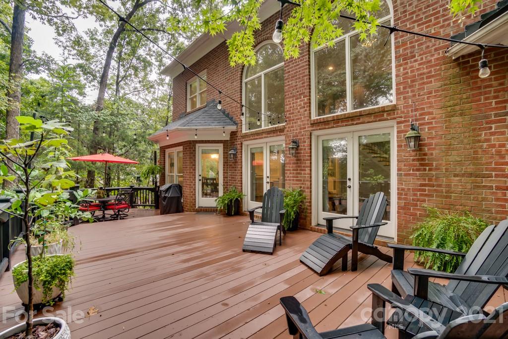 833 Amanda Drive Matthews, NC 28104 - Photo 9 of 48 a view of a house with sitting area and garden