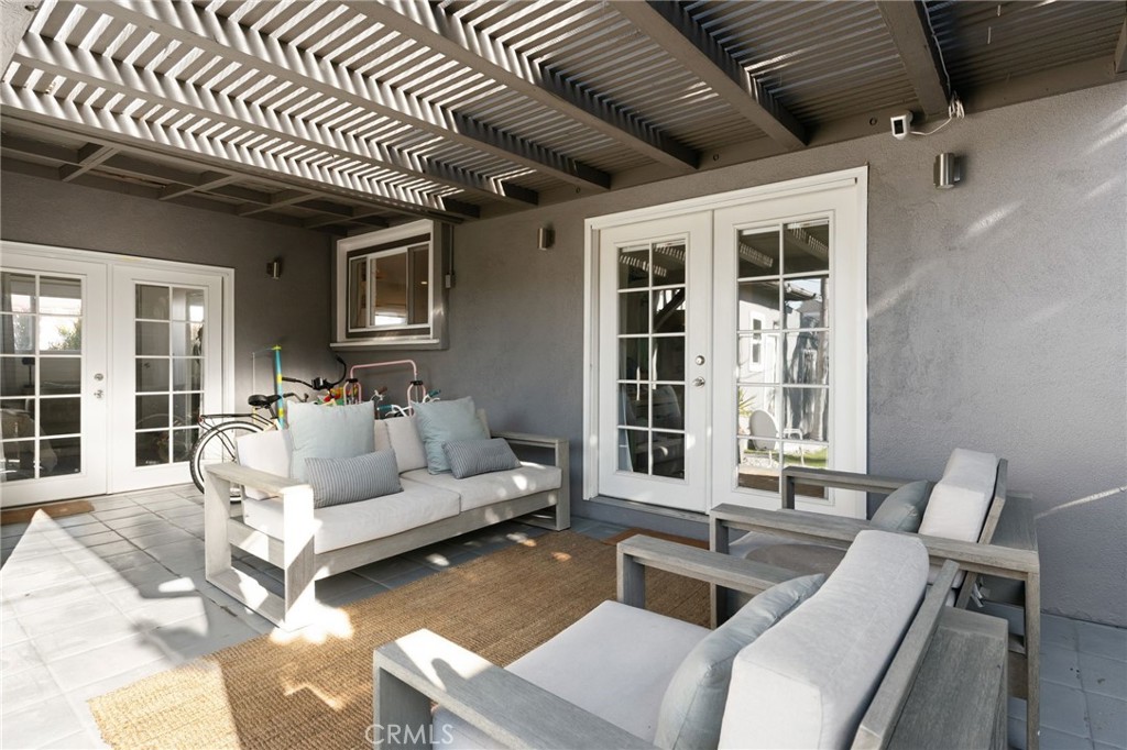 7901 Flight Los Angeles, CA 90045 - Photo 19 of 24 a living room with furniture and windows
