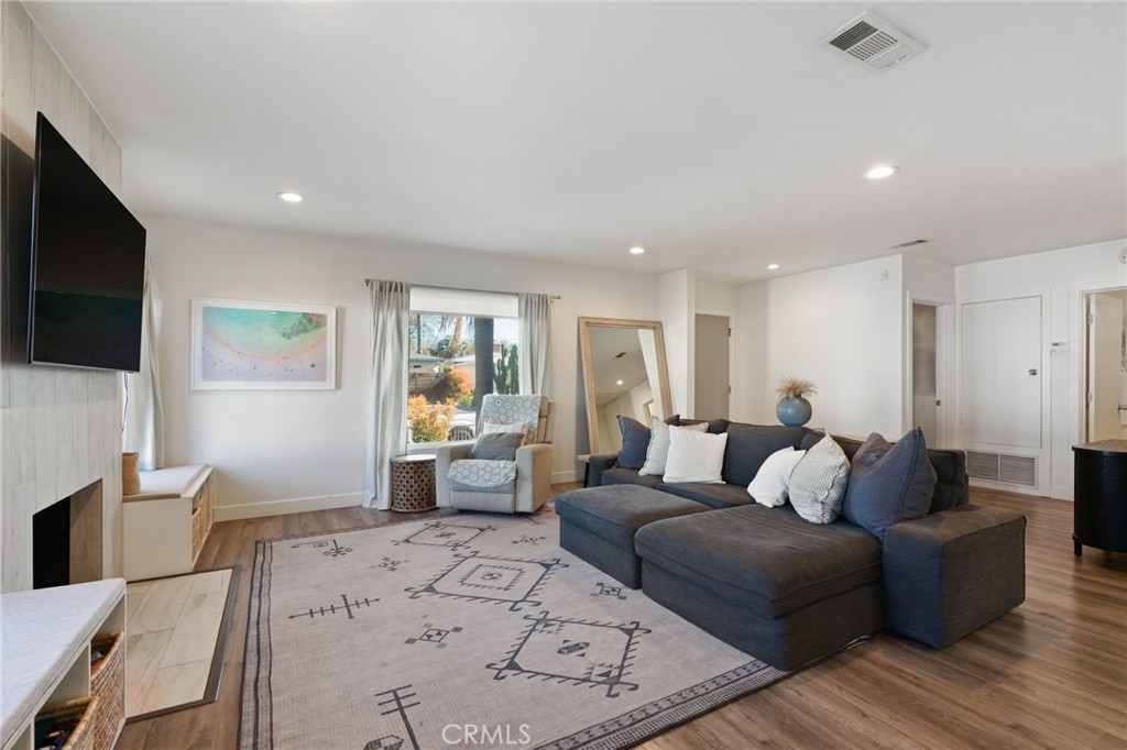 7901 Flight Los Angeles, CA 90045 - Photo 4 of 24 a living room with furniture and a flat screen tv
