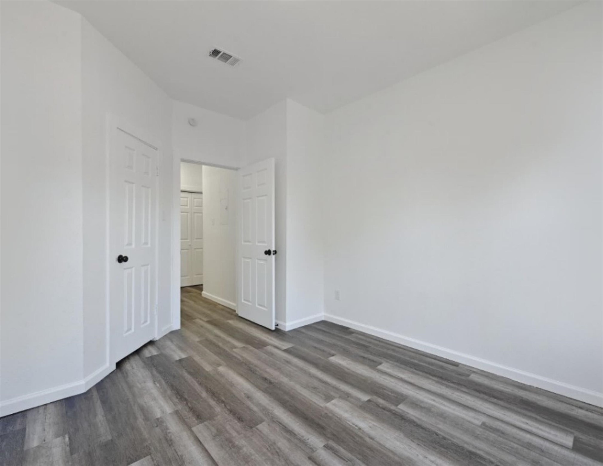 9508 Kempler Drive, Unit B Austin, TX 78748 - Photo 8 of 12 a view of room with wooden floor