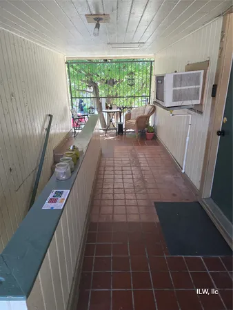 a room with cabinets washer and dryer