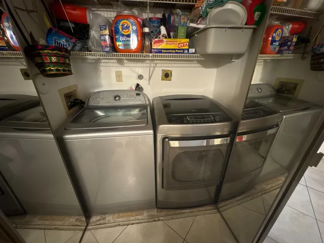 a utility room with dryer and washer