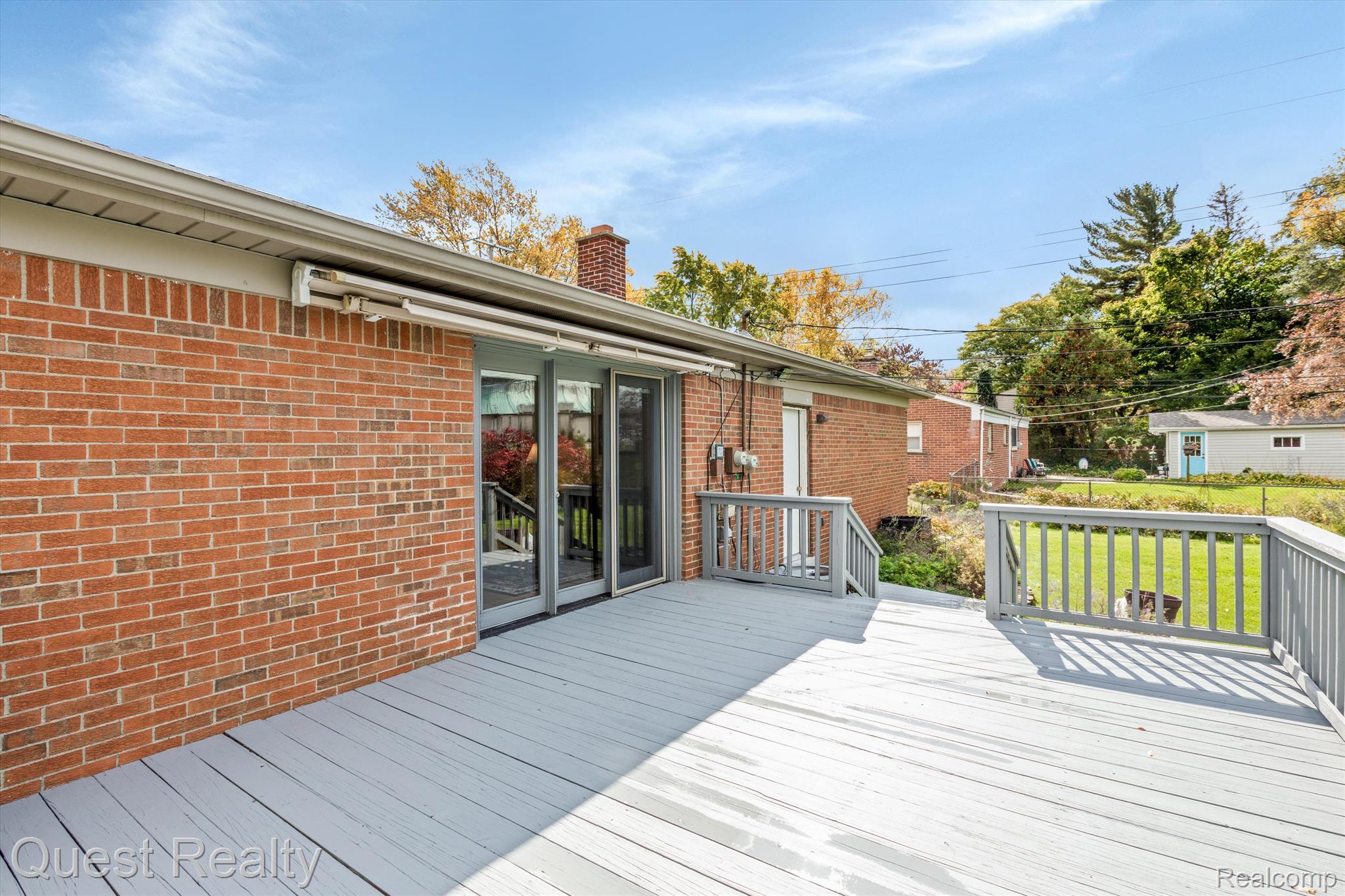 1401 Sycamore Drive Rochester, MI 48307 - Photo 38 of 45 large deck with awning