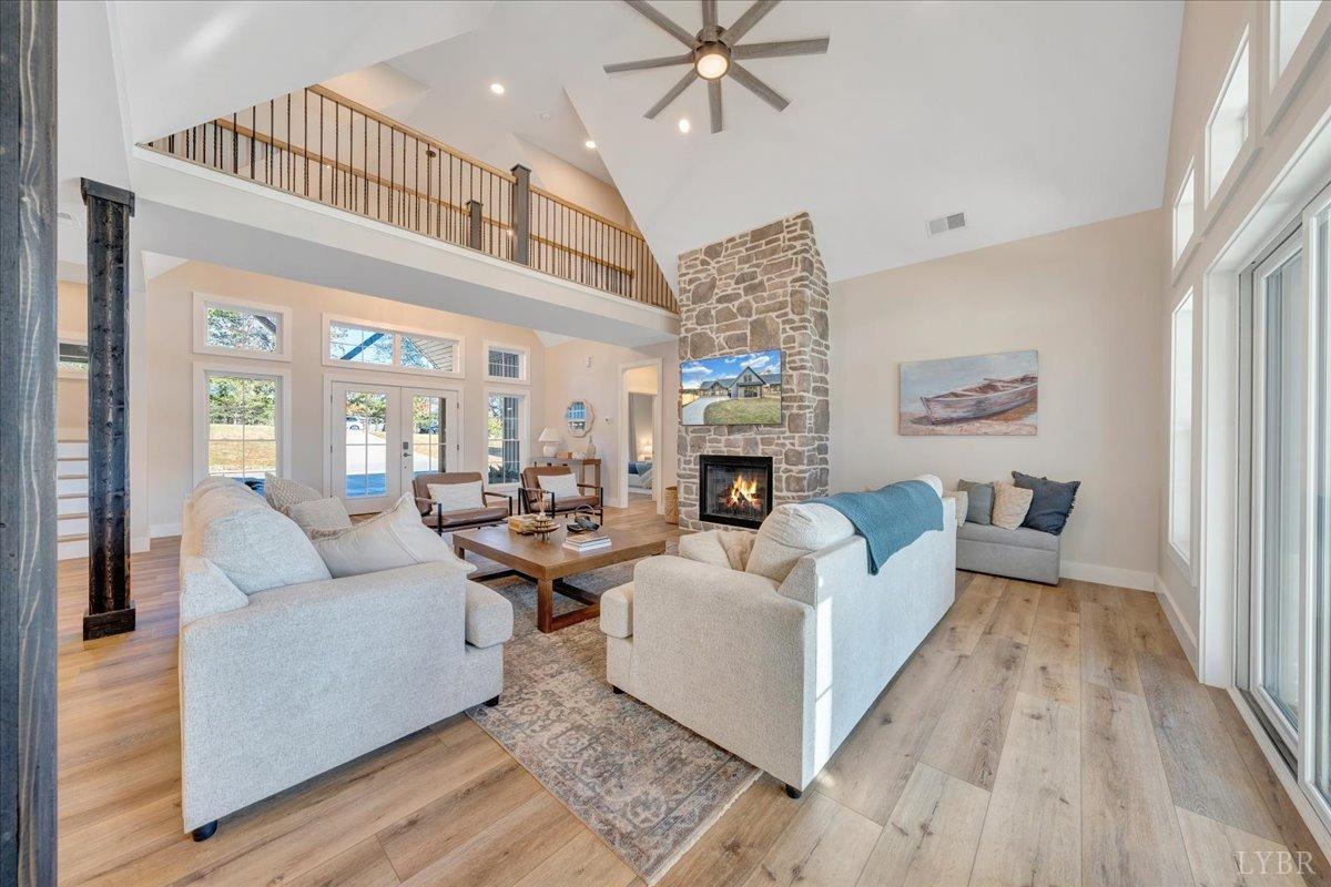 317 Bass Cove Road Huddleston, VA 24104 - Photo 11 of 90 a living room with furniture and a fireplace