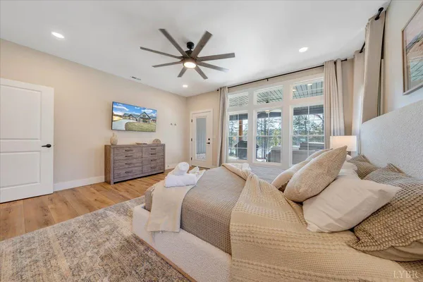 a bathroom with a granite countertop sink mirror bathtub and shower