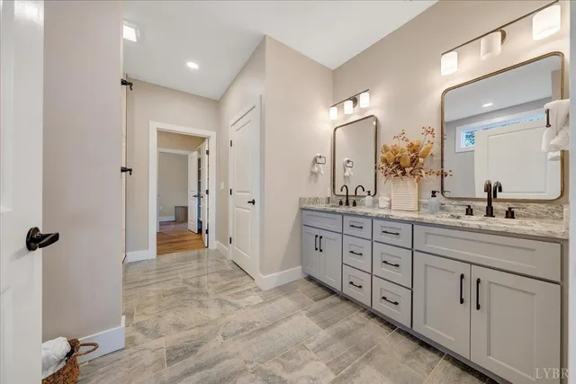 a bedroom with a large bed and a large window