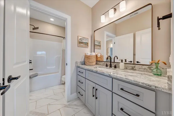 a view of a living room and kitchen