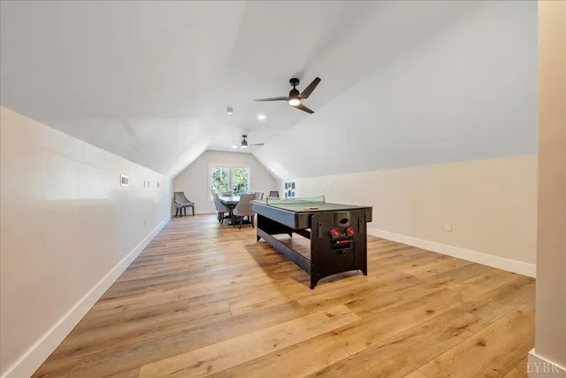 an aerial view of a house with a lake view