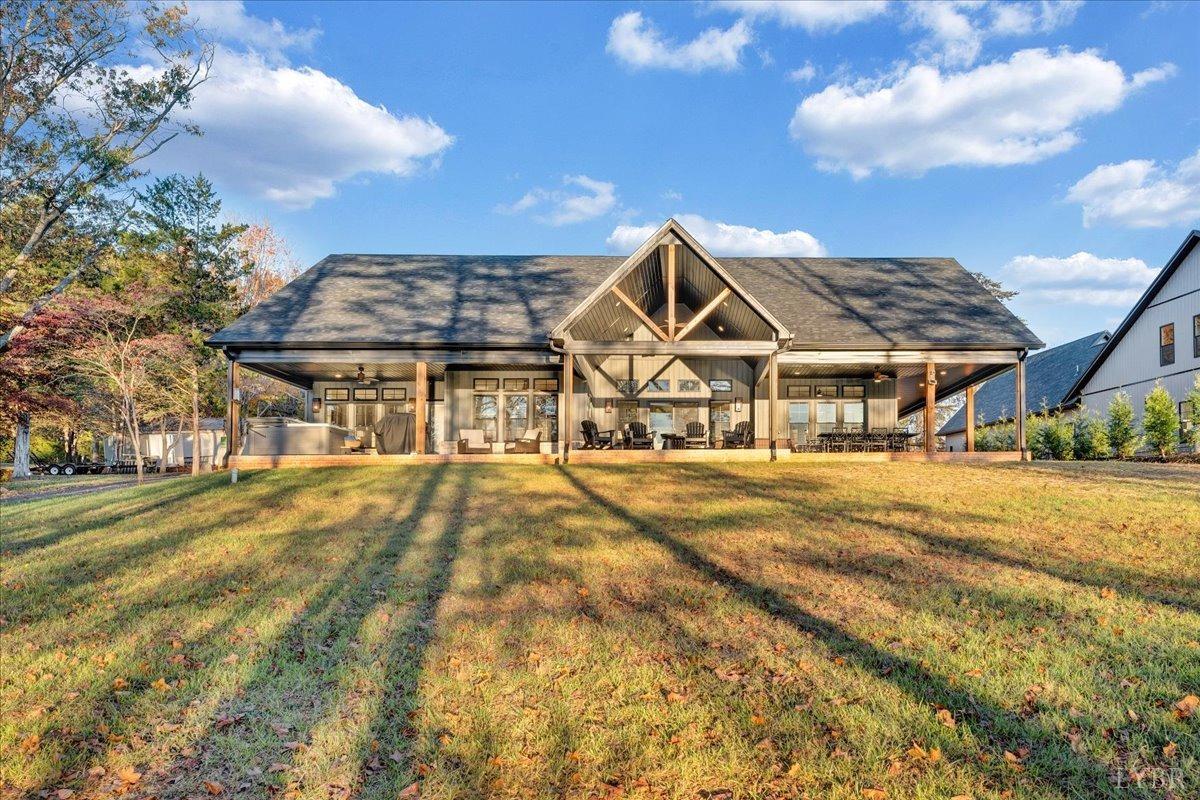 317 Bass Cove Road Huddleston, VA 24104 - Photo 67 of 90 a front view of a house with a yard
