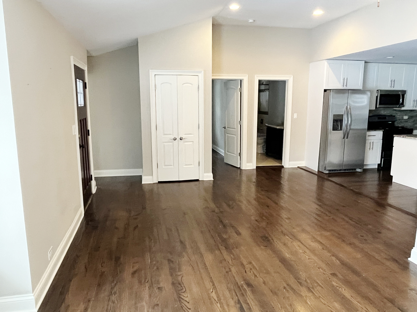 1253 Sunset Ridge Road Northbrook, IL 60062 - Photo 31 of 31 a view of a kitchen with a refrigerator and wooden floor