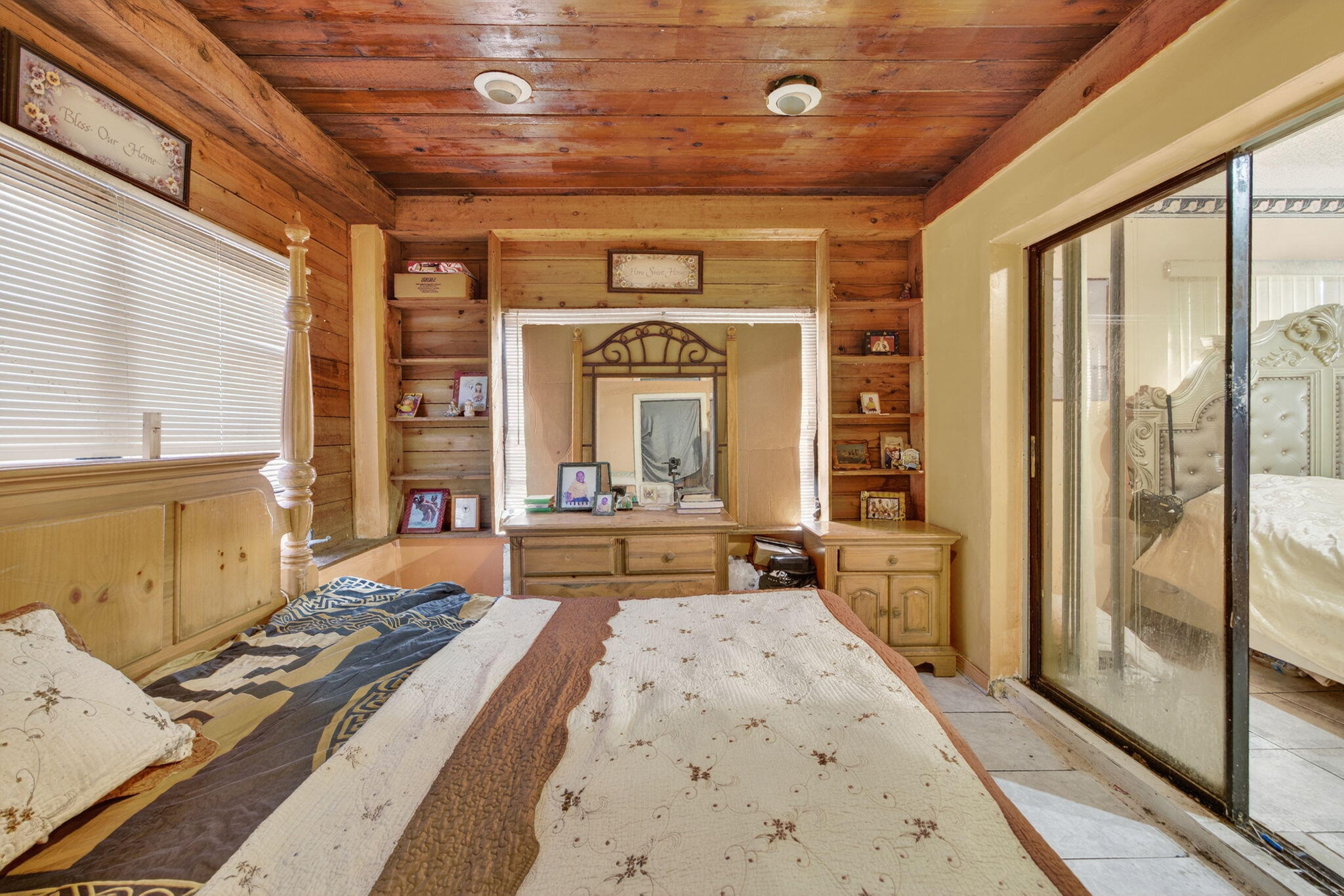 9281 Martinique Drive Miami, FL 33189 - Photo 25 of 35 a bedroom with furniture and a large window