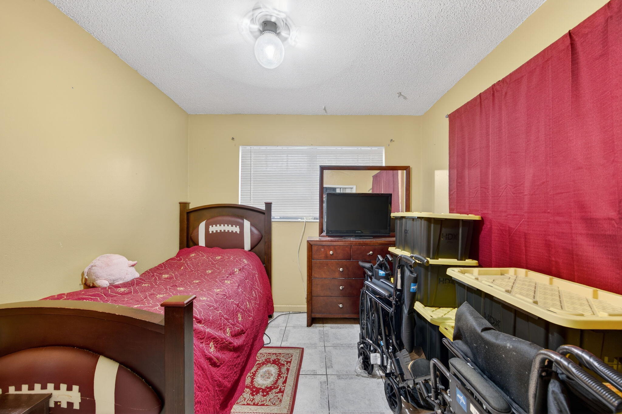 9281 Martinique Drive Miami, FL 33189 - Photo 26 of 35 a bedroom with a bed and a desk