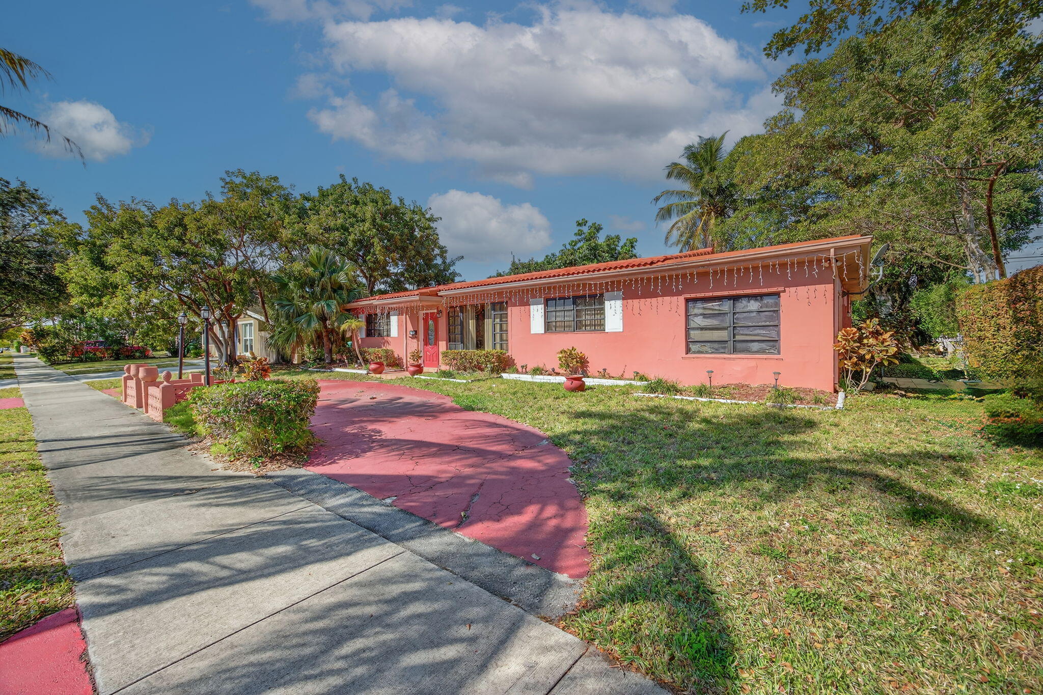 9281 Martinique Drive Miami, FL 33189 - Photo 3 of 35 a view of a house with a yard