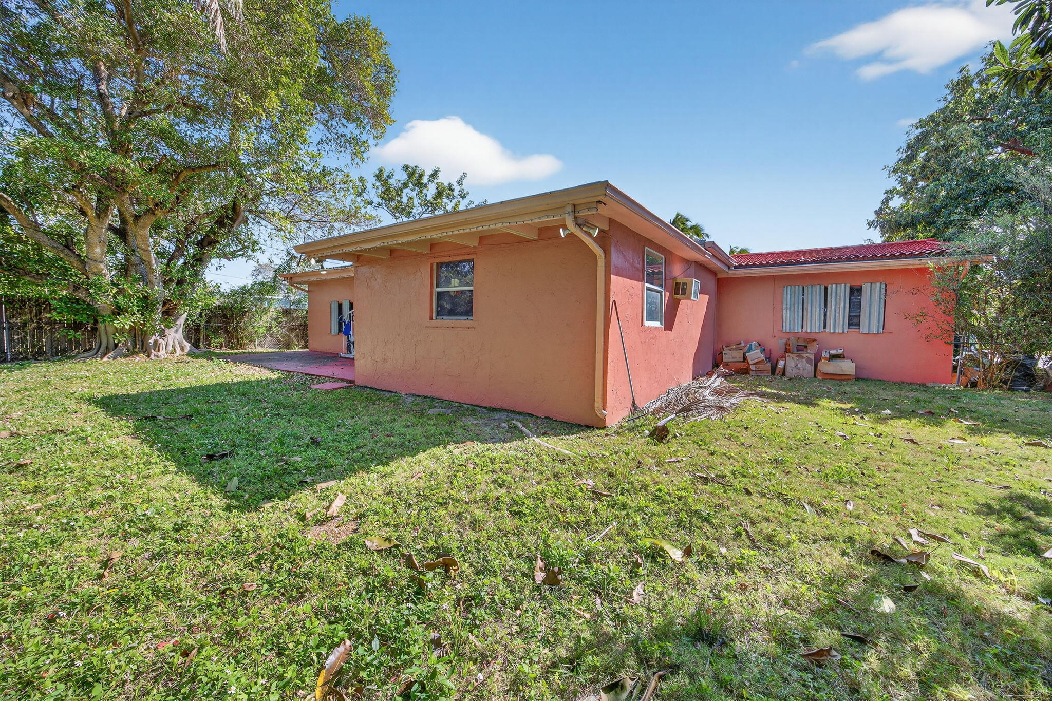 9281 Martinique Drive Miami, FL 33189 - Photo 35 of 35 a backyard of a house with lots of green space