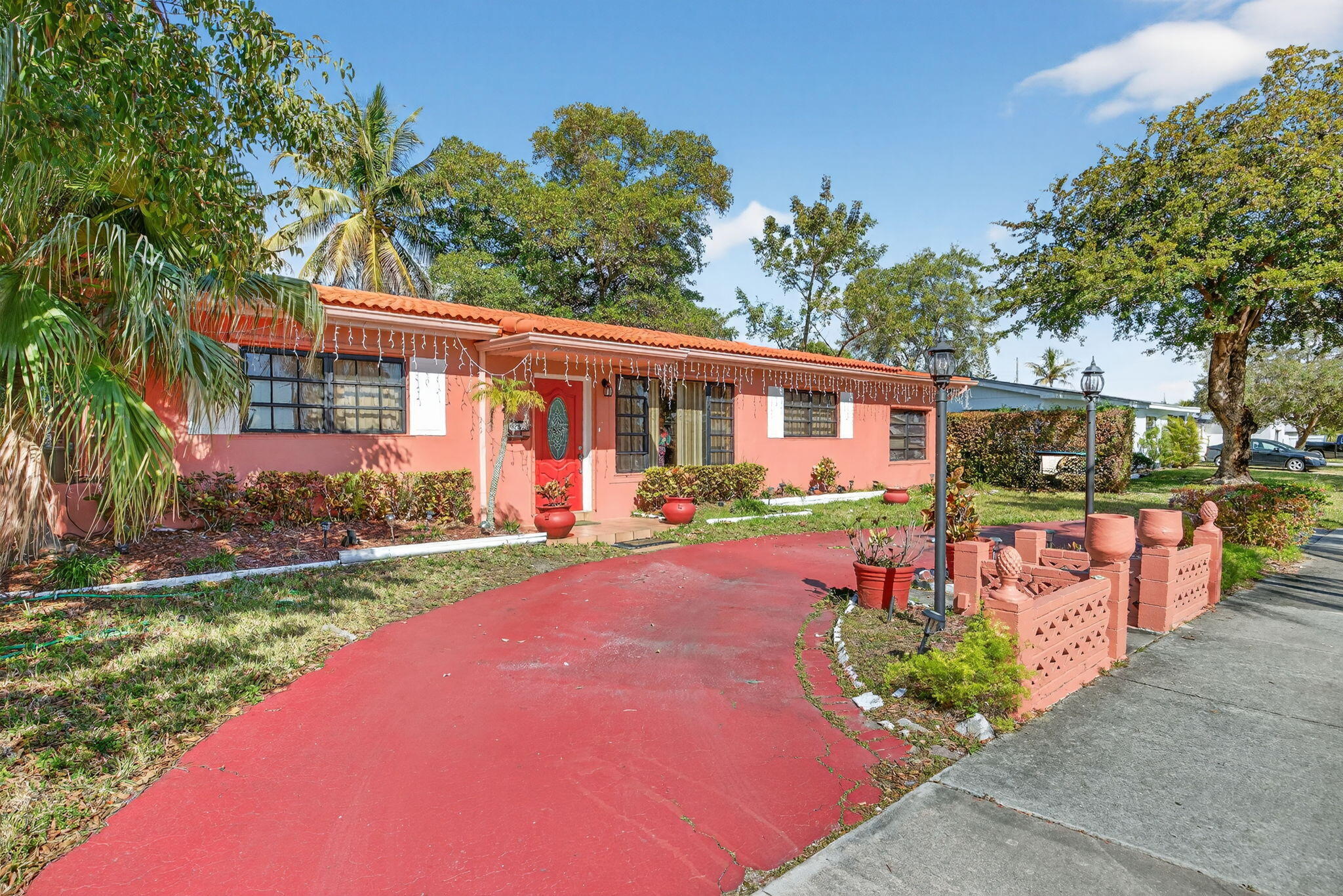 9281 Martinique Drive Miami, FL 33189 - Photo 5 of 35 front view of a house with a yard