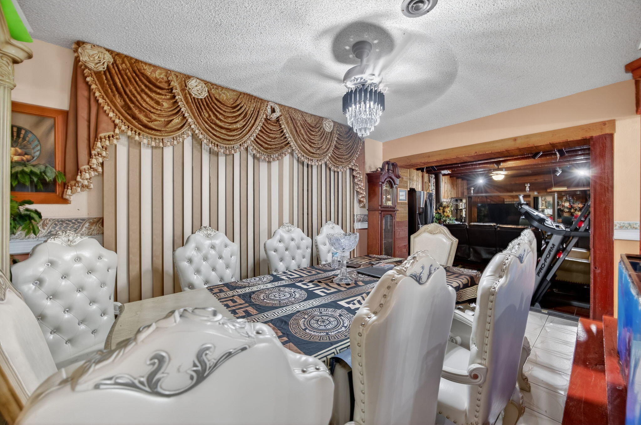 9281 Martinique Drive Miami, FL 33189 - Photo 10 of 35 a view of a dining room with furniture and chandelier